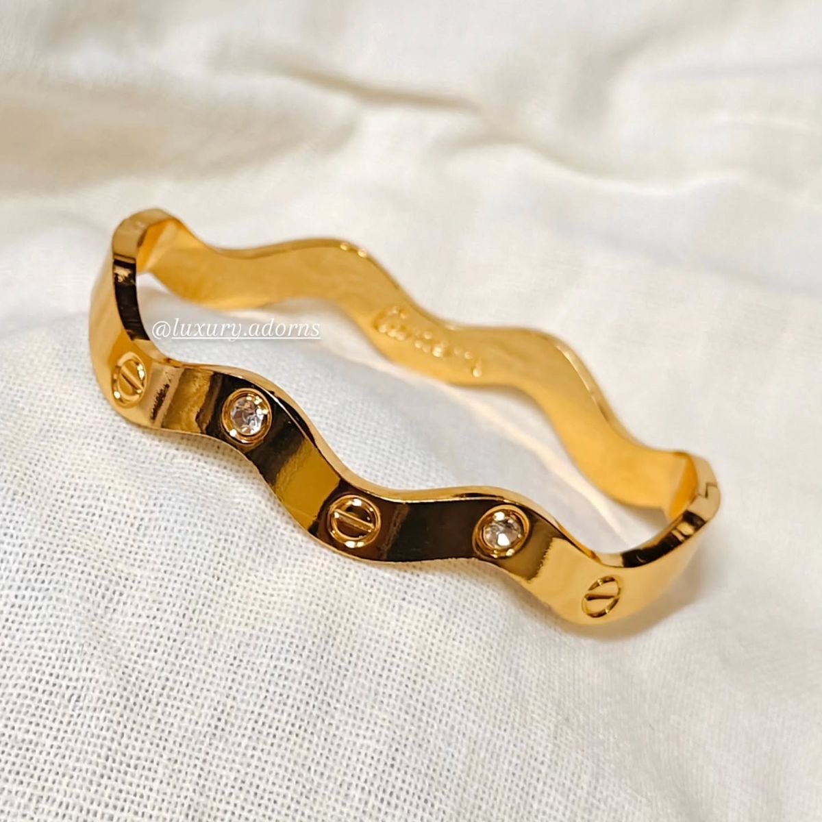 Wavy Cartier bangle